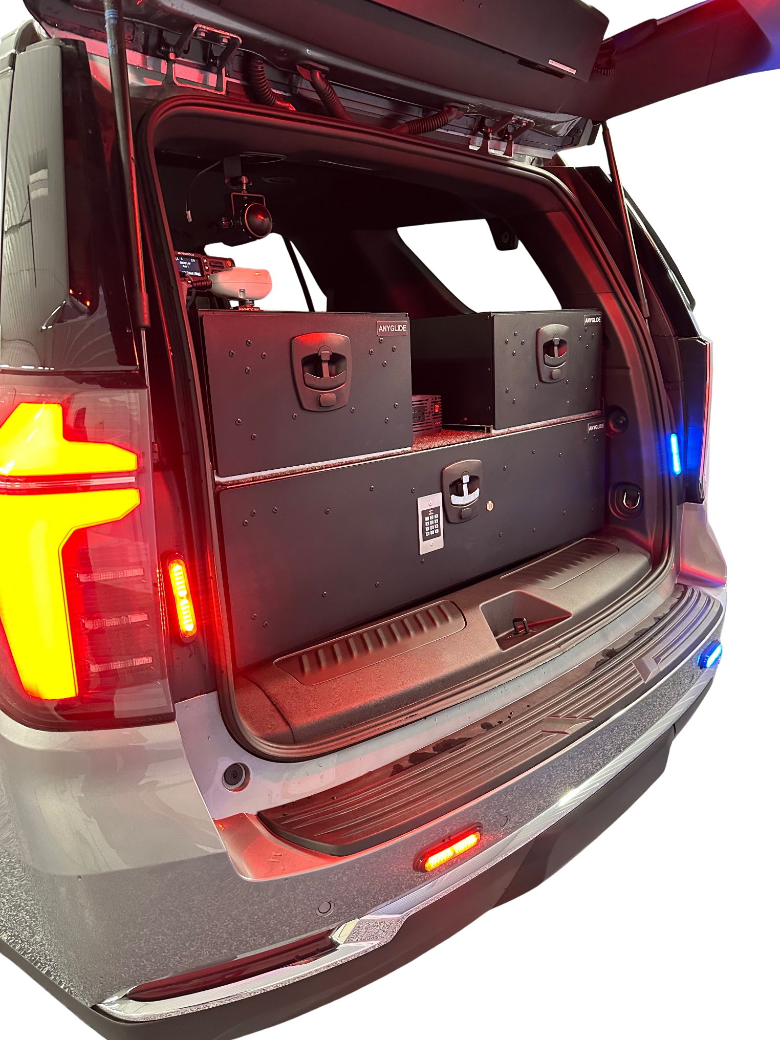Open trunk of a vehicle with a toolbox inside for AnyGlide Chevy Tahoe Gorilla